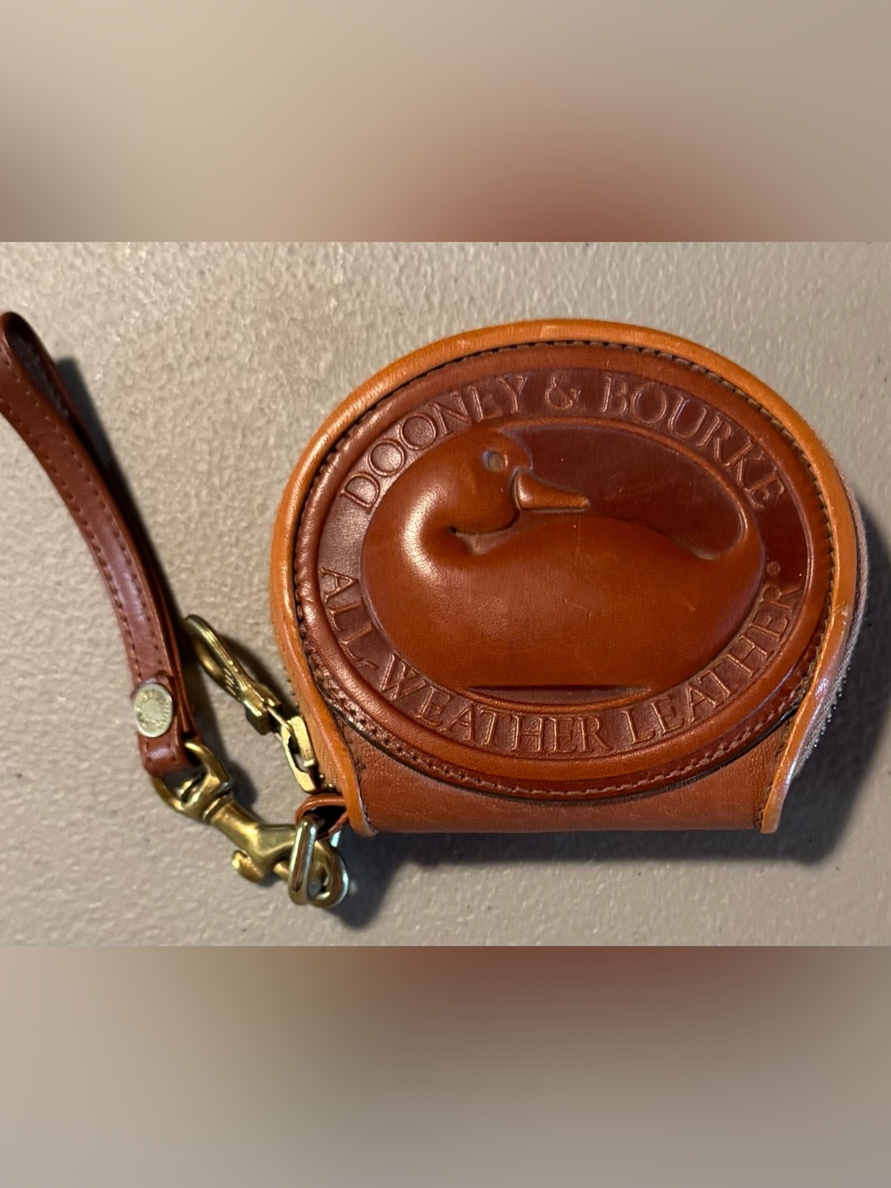 Dooney & Bourke Brown Leather Coin Pouch with Duck Medallion
